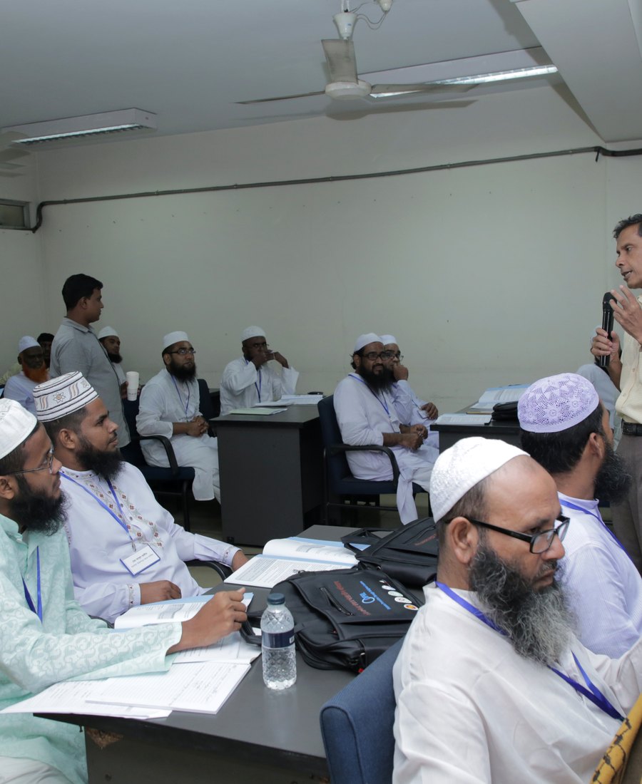 Imams participating in a training session